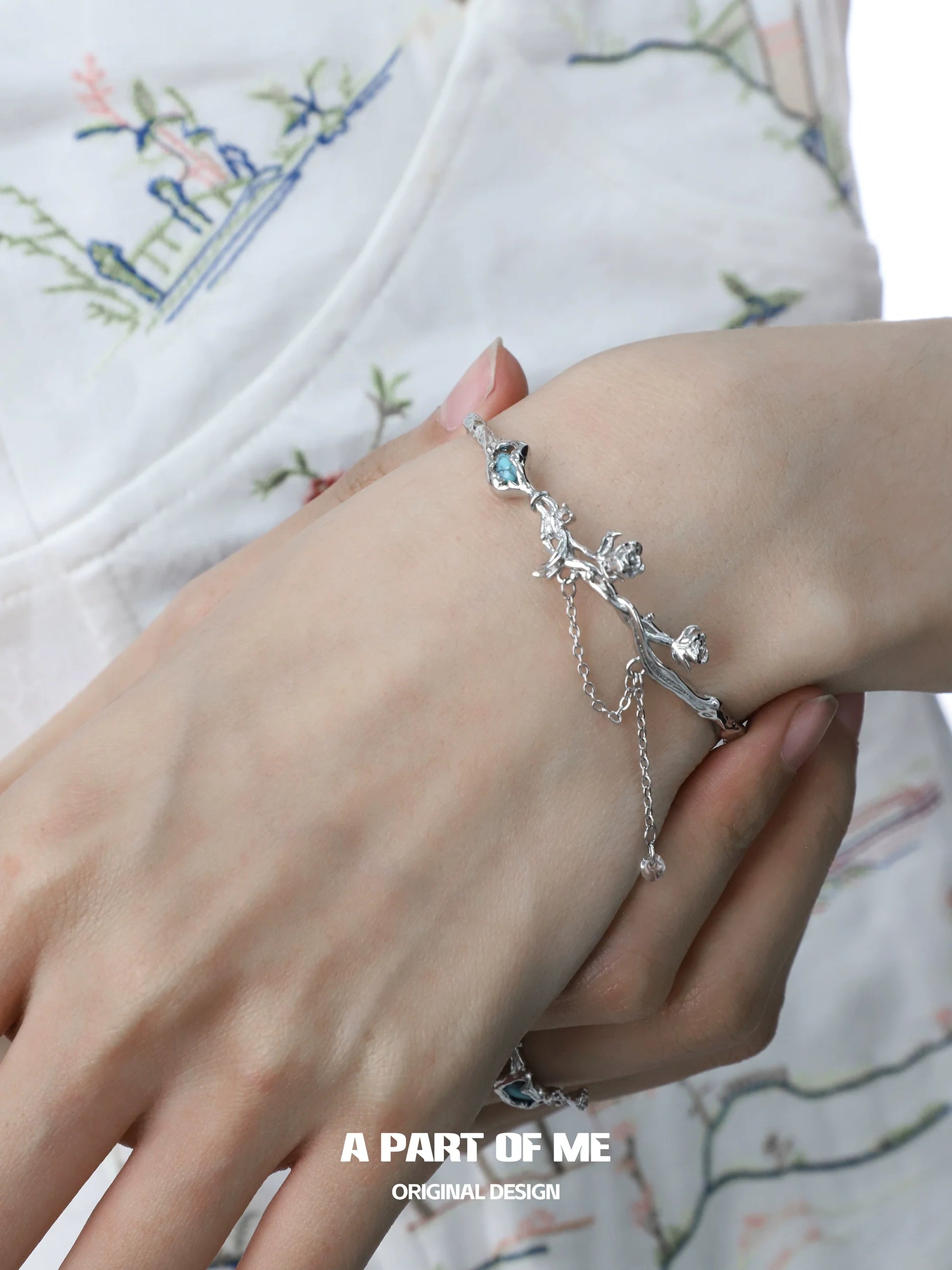 Turquoise flower bracelet from A PART OF ME with delicate floral design and adjustable clasp