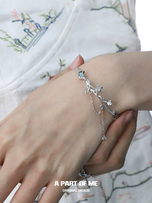 Turquoise flower bracelet from A PART OF ME with delicate floral design and adjustable clasp