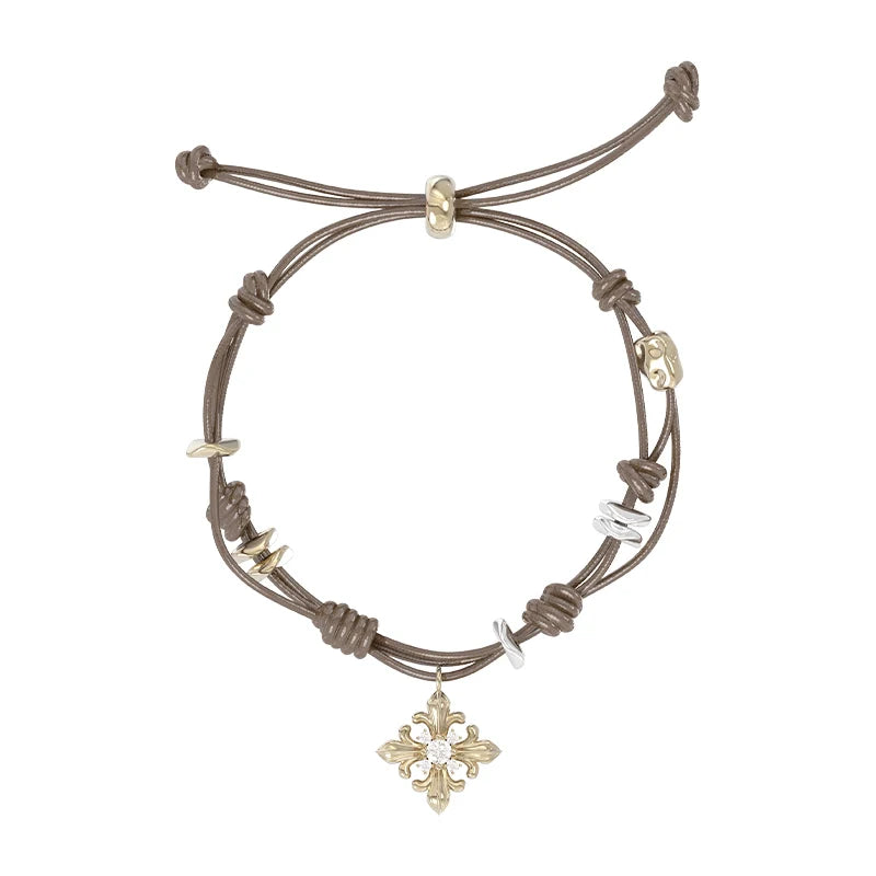 Twilight Iris braided bracelet with adjustable closure and decorative charm for a stylish look