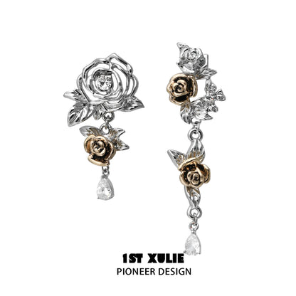 Twilight rose punk earrings featuring silver and gold floral designs with dangling crystals