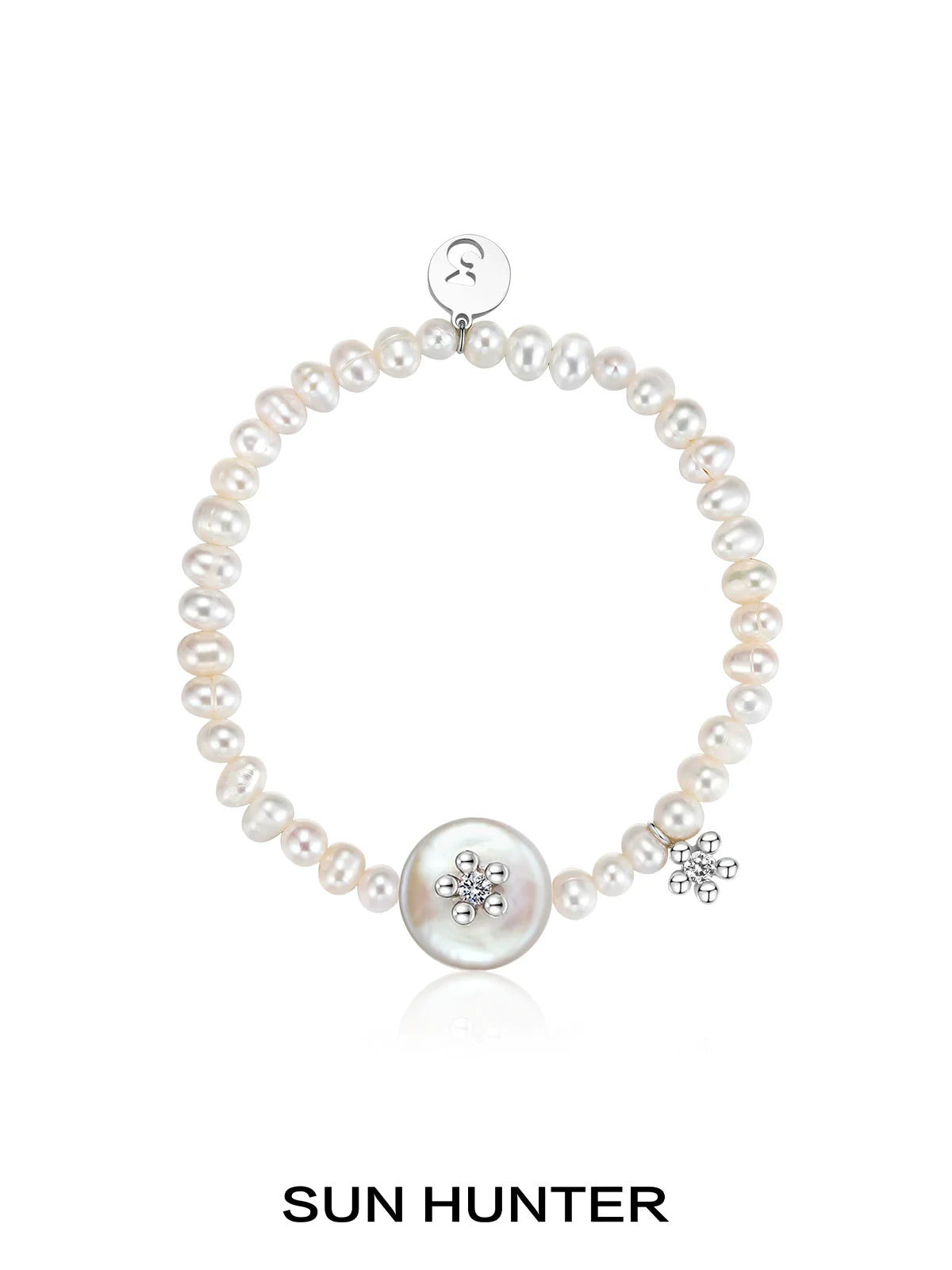 SUN HUNTER unique pearl bracelet featuring a large centerpiece and sparkling accents