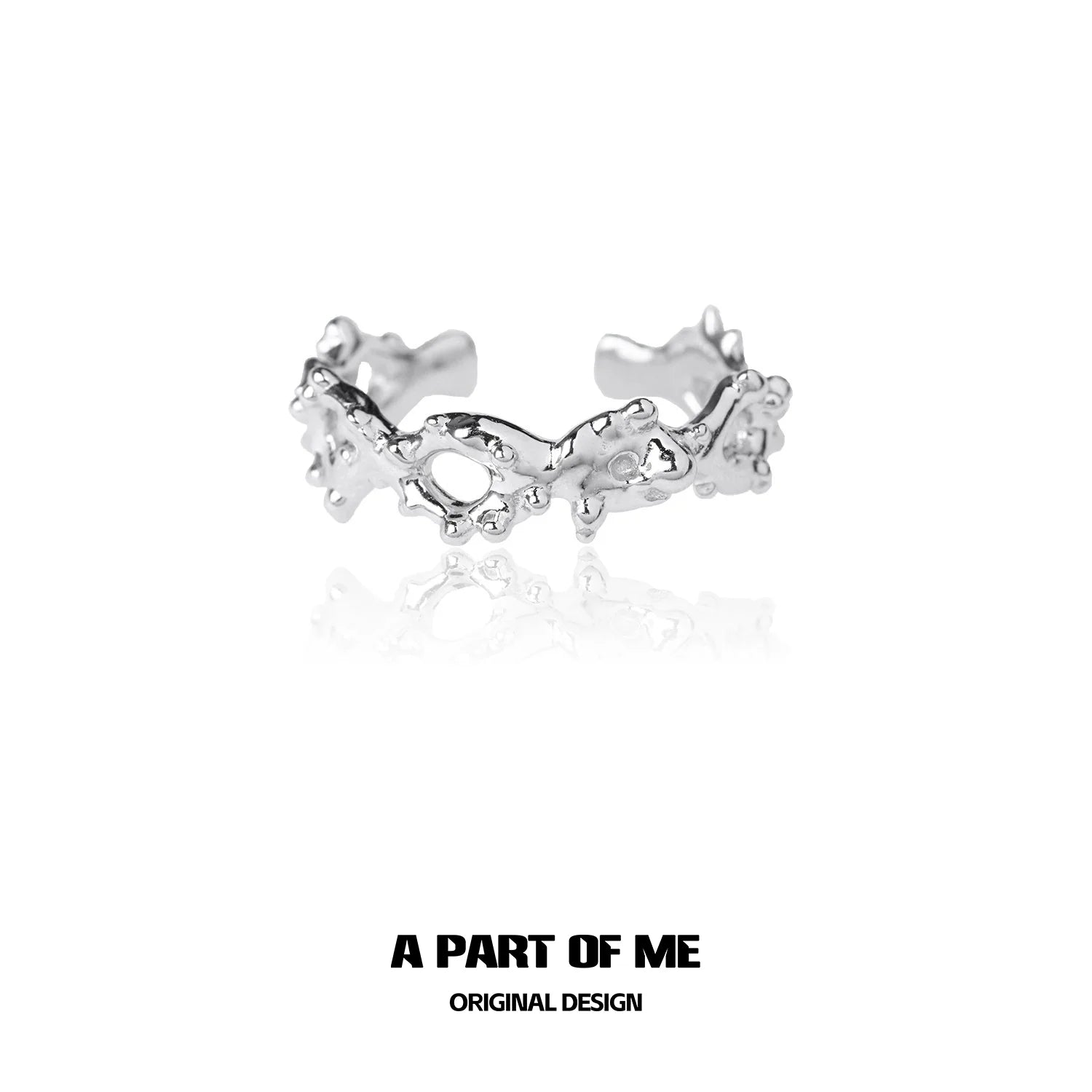 Unique silver ring by A PART OF ME featuring an artistic design with textured details