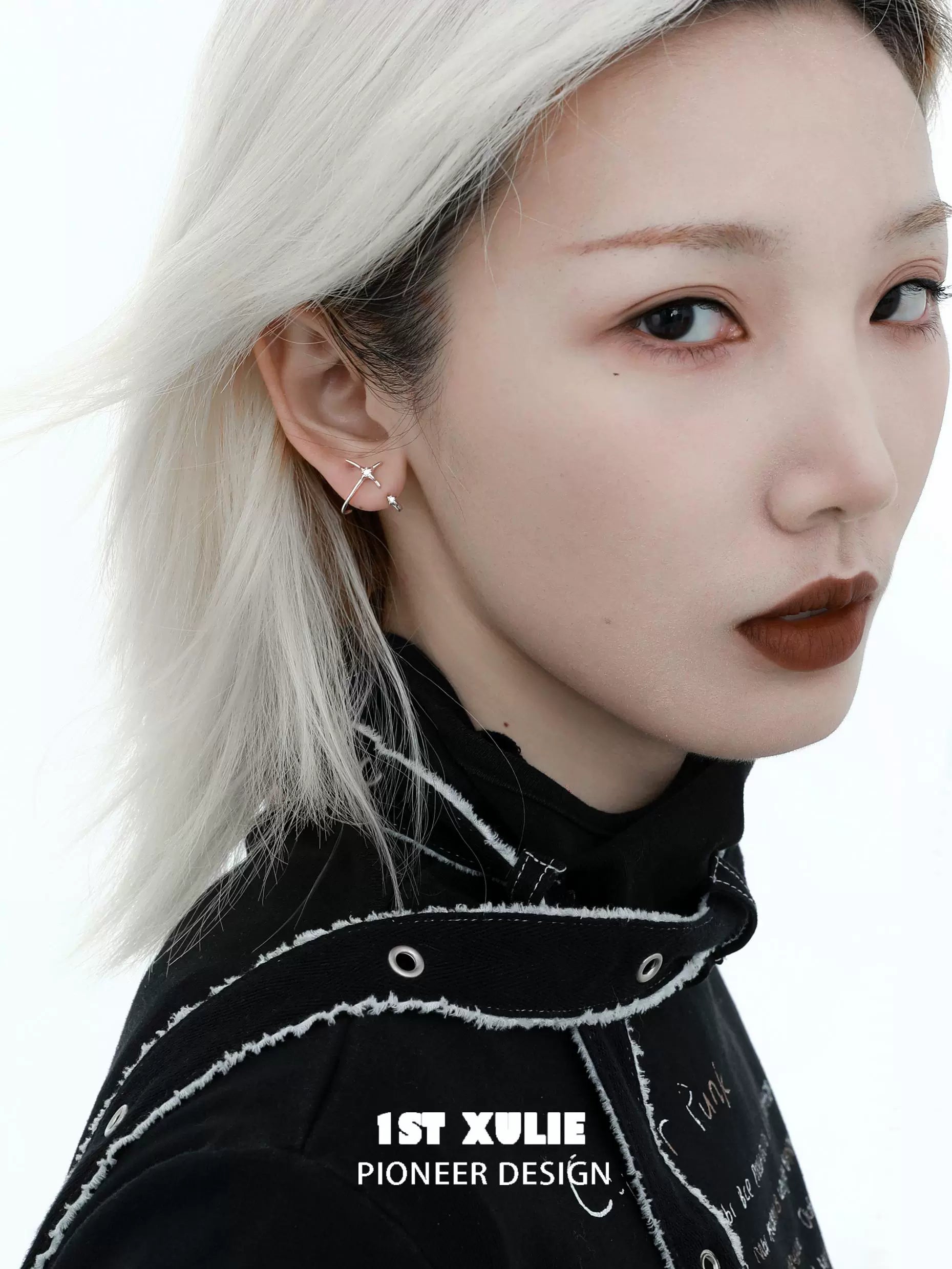 Model showcasing unique zircon stud earrings with a modern design and elegant finish