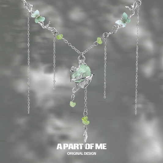 A Part of Me forest fairy fluorite necklace with delicate floral design and butterfly accents