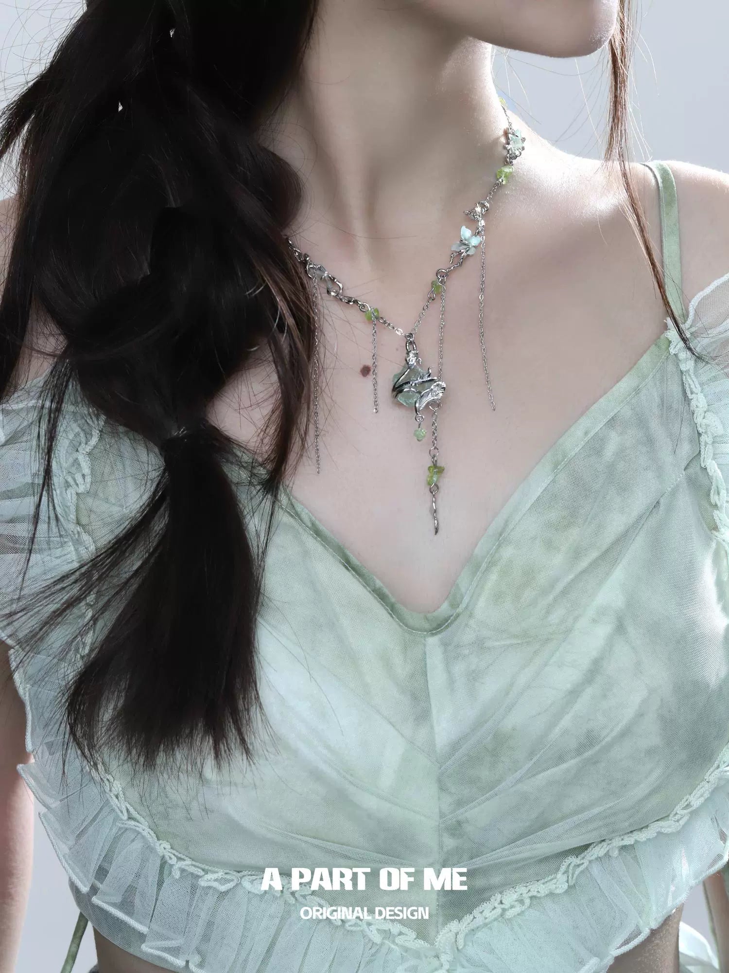 Elegant forest fairy fluorite necklace featuring silver accents and delicate charms