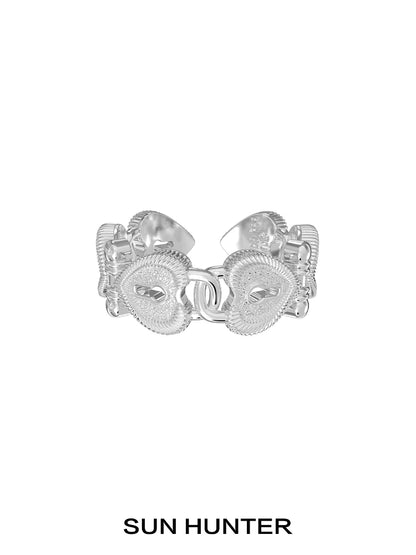 Silver SUN HUNTER love lock chain ring featuring heart-shaped designs and a stylish finish