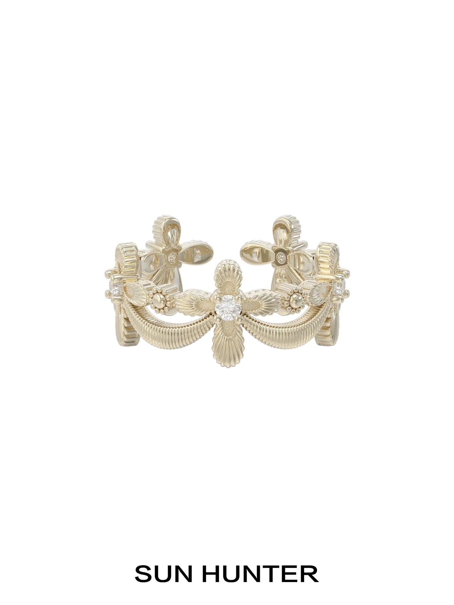 Elegant SUN HUNTER shimmer cross ring featuring intricate detailing and a sparkling center stone