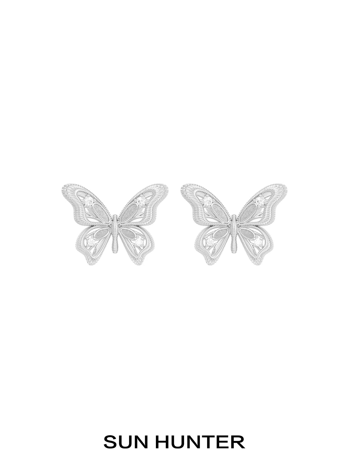 SUN HUNTER vintage butterfly earrings in silver, featuring intricate detailing and elegant design