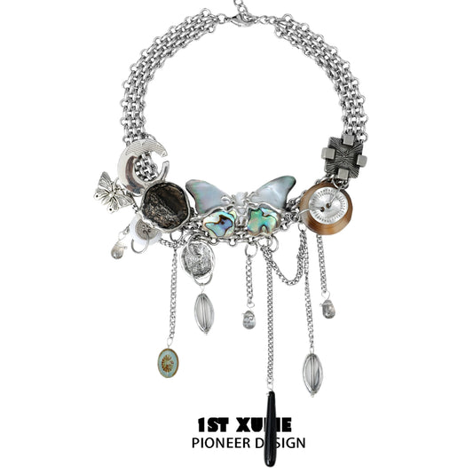 Unique vintage butterfly necklace with diverse charms and silver-tone chains for a stylish look