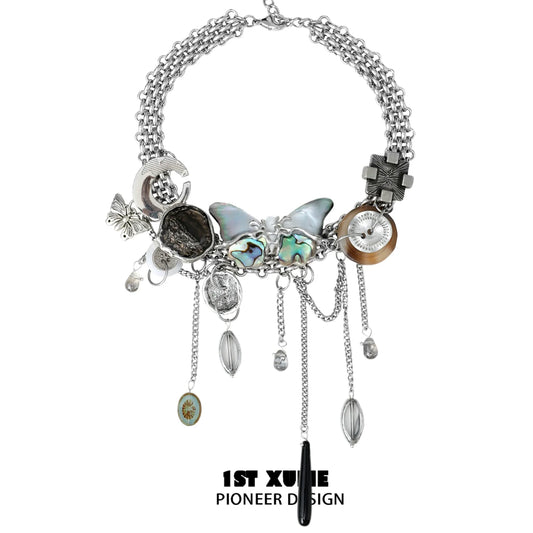 Unique vintage butterfly necklace with diverse charms and silver-tone chains for a stylish look
