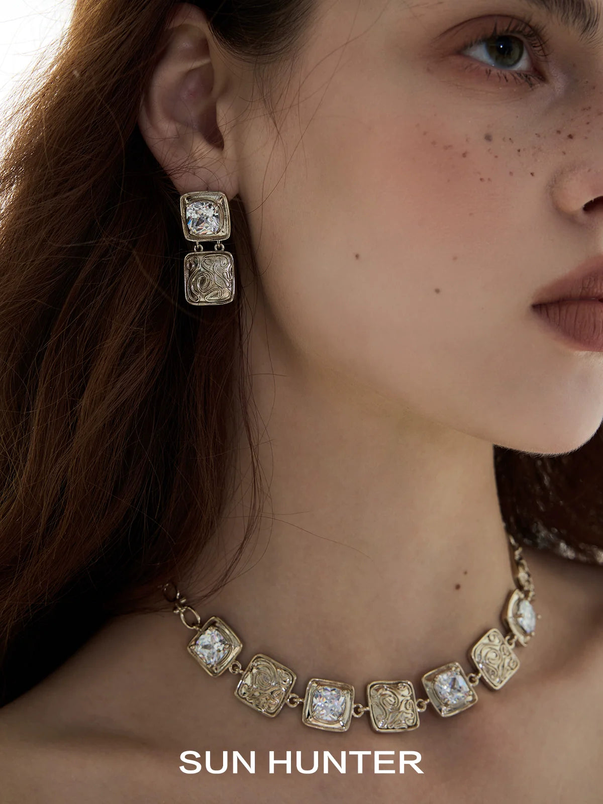Elegant SUN HUNTER vintage coin earrings in gold with intricate detailing, perfect for a stylish look