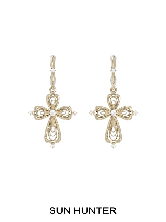 Elegant SUN HUNTER vintage cross earrings featuring intricate designs and sparkling accents