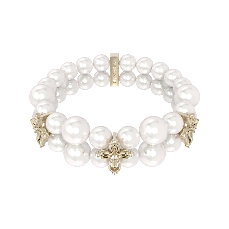 SUN HUNTER vintage cross pearl bracelet with elegant pearl design and decorative cross accents