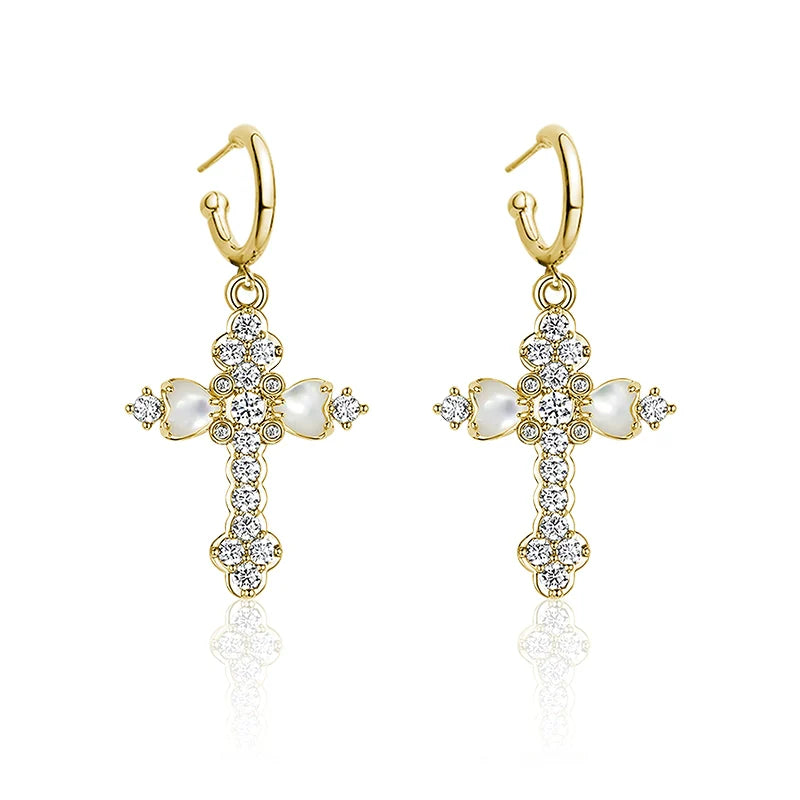 Golden vintage cross zircon earrings featuring sparkling stones and a charming design