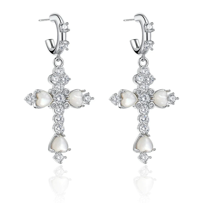 Elegant vintage cross zircon earrings featuring sparkling details and a unique design