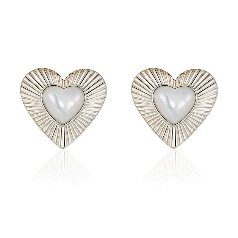 SUN HUNTER vintage heart stud earrings with radiant design and pearl center for elegant style