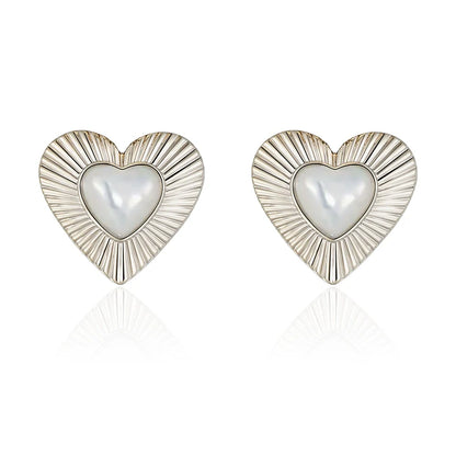 SUN HUNTER vintage heart stud earrings with radiant design and pearl center for elegant style