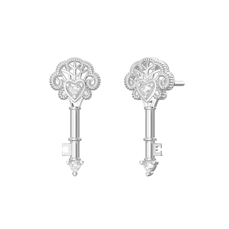SUN HUNTER vintage lace key earrings featuring an intricate heart and key design in silver