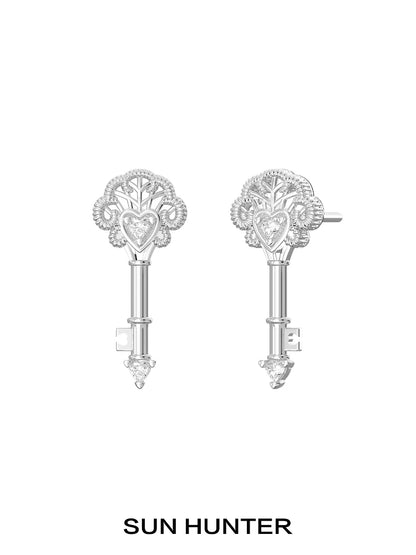SUN HUNTER vintage lace key earrings in silver with intricate heart and tree design