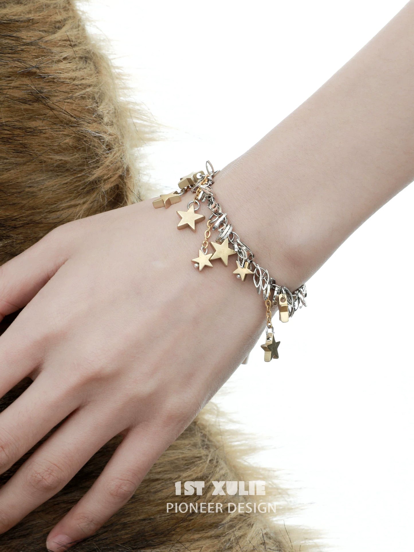 Vintage star tassel silver bracelet with dangling star charms for stylish accessorizing