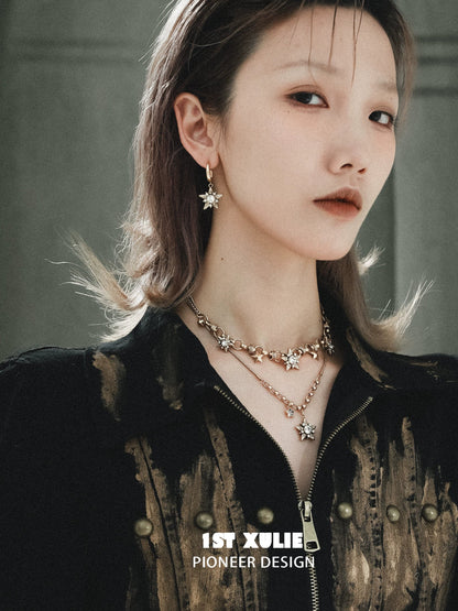 Elegant vintage starlight pendant necklace paired with matching earrings for a sophisticated look