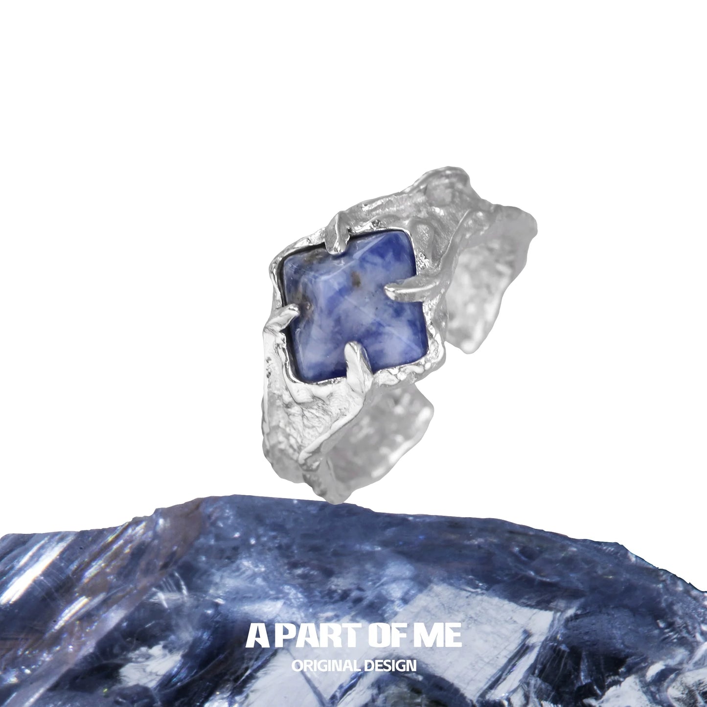 A unique silver ring featuring a stunning violet gemstone ring centered on a textured band