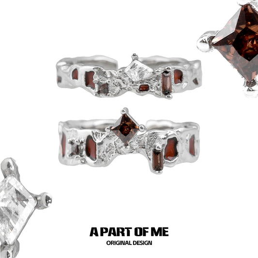 A PART OF ME Wasteland Diamond Ring featuring a unique design with clear and brown diamonds