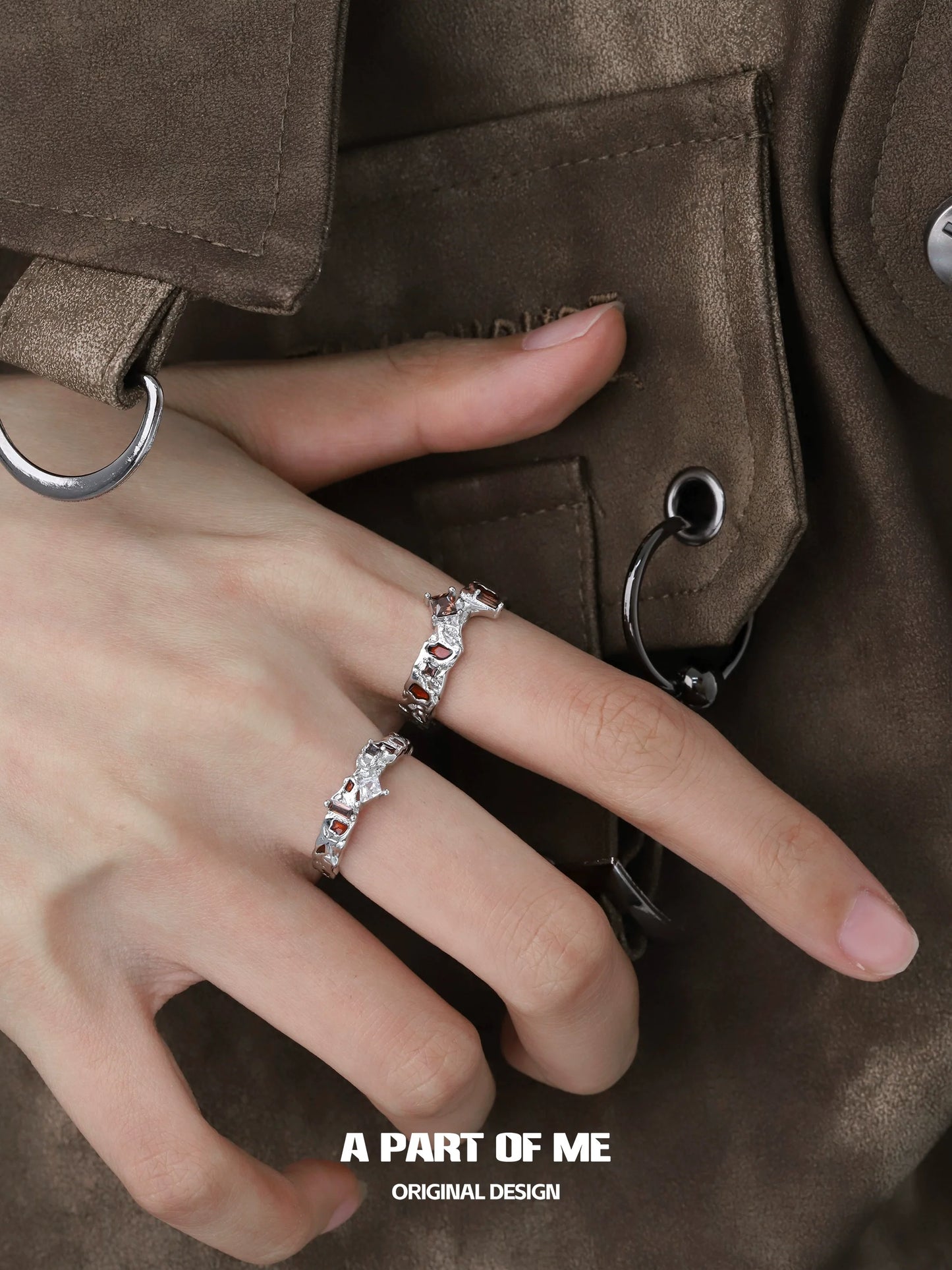 A PART OF ME wasteland diamond ring on a hand, showcasing elegant design and sparkling details