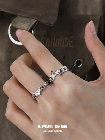 A PART OF ME Wasteland Diamond Ring on a hand, showcasing elegant design and sparkling stones