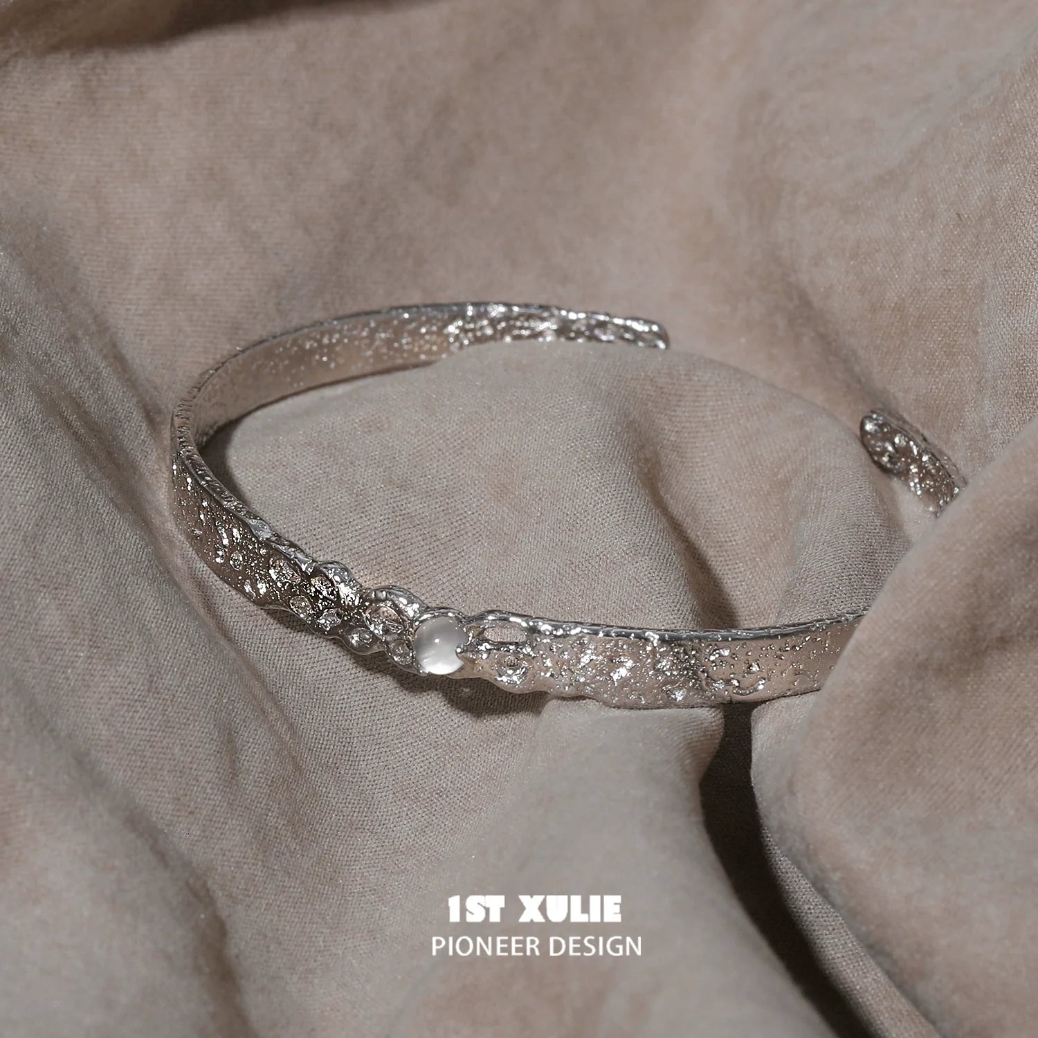 Elegant white agate bangle bracelet with textured silver design for stylish accessories