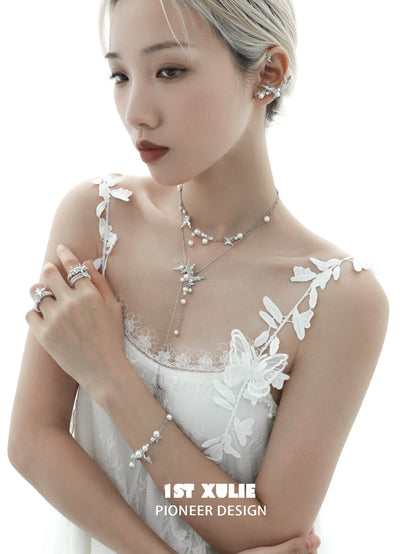 Elegant white butterfly pearl bracelet featuring delicate designs for a stylish look
