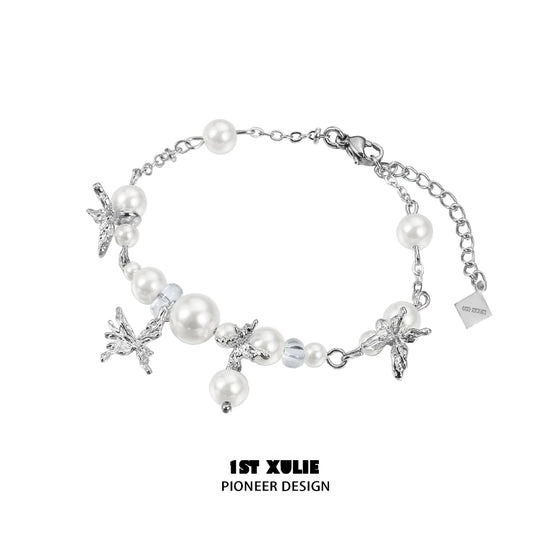 Elegant white butterfly pearl bracelet with silver accents for a chic look