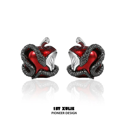 Wicked apple snake ear studs featuring a red apple design with intricate snake detailing