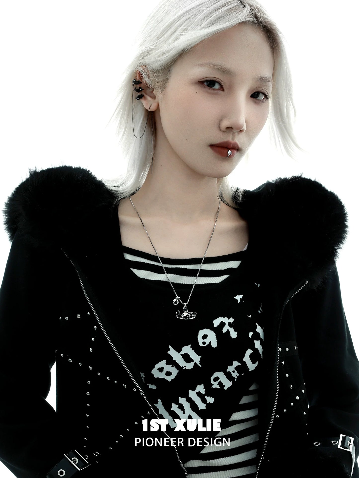 Model wearing Y2K black cat ear cuffs paired with a stylish black jacket and striped shirt