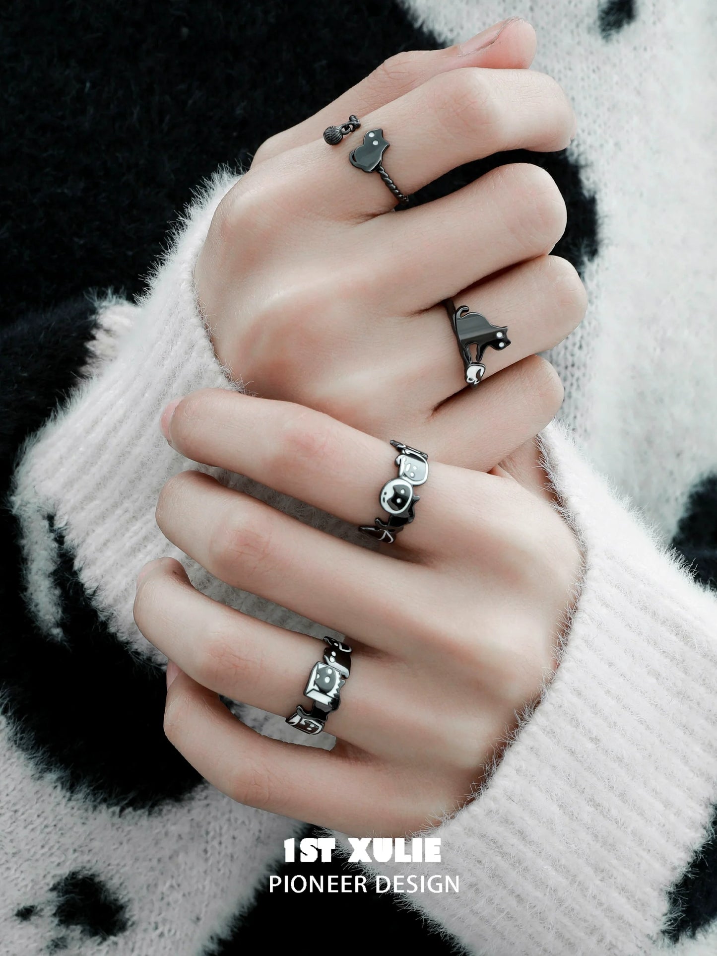 Stylish Y2K black cat ring showcased on fingers with various unique designs for trendy looks