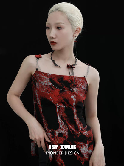 Y2K blood mandala tassel earrings displayed on a model wearing a stylish top