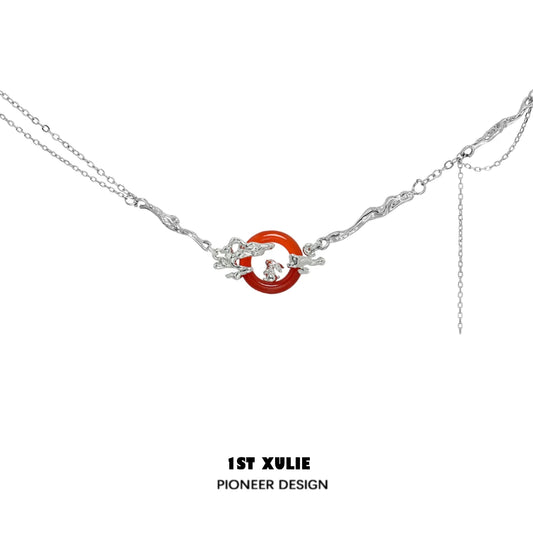 Y2K bunny necklace with silver chains and a unique red circle centerpiece, perfect for trendy outfits