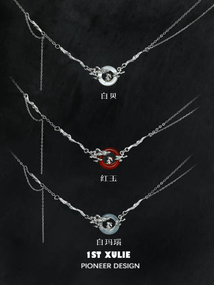 Three styles of 1STXULIE Y2K bunny necklace featuring unique designs and colors in silver and red