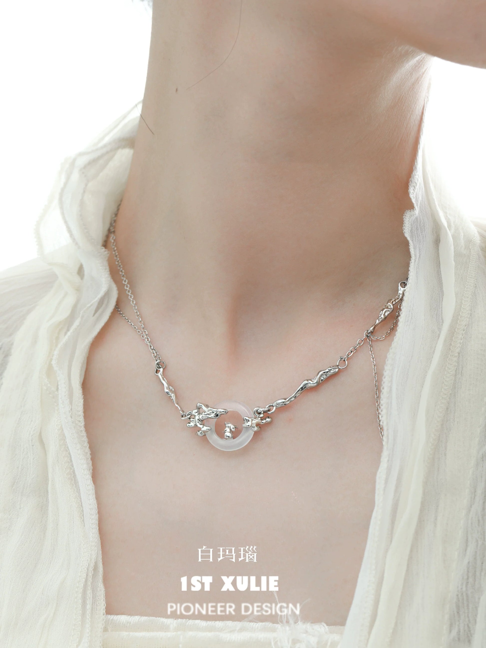 Trendy Y2K bunny necklace featuring a unique design with twisted silver links