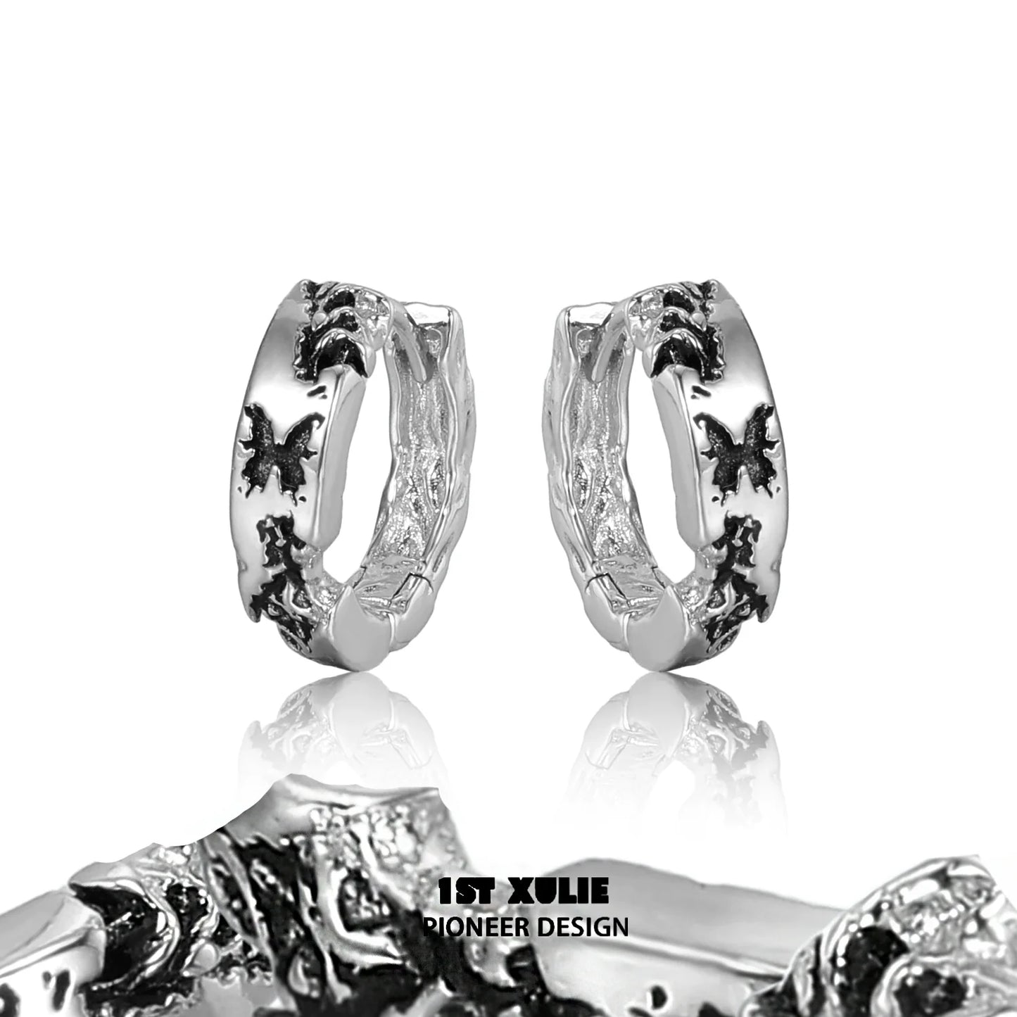 Stylish Y2K butterfly earrings in silver featuring intricate designs and a modern look