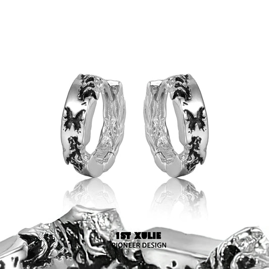 Stylish Y2K butterfly earrings in silver featuring intricate designs and a modern look