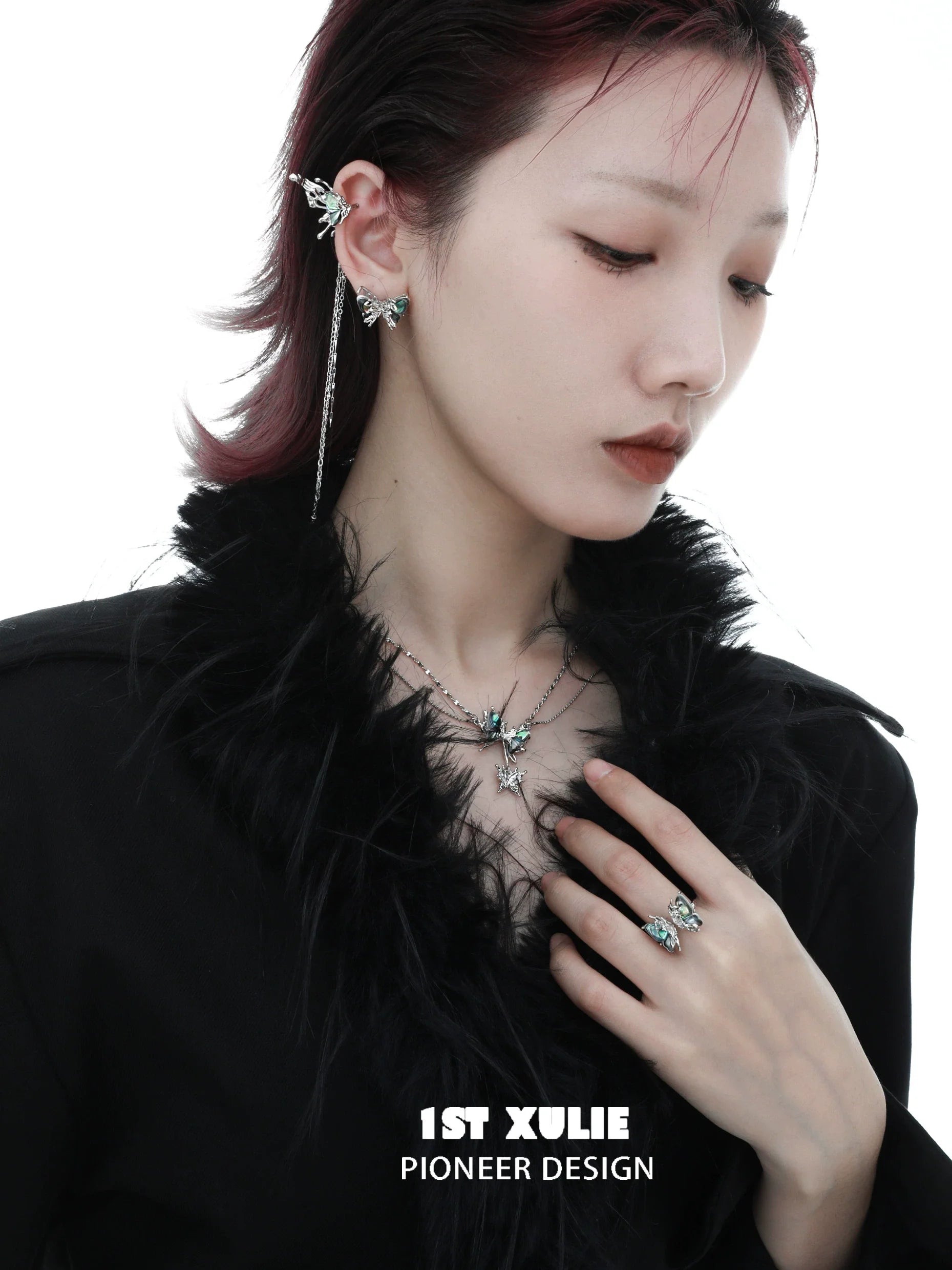 Model wearing Y2K butterfly necklace with matching earrings and ring for a trendy look