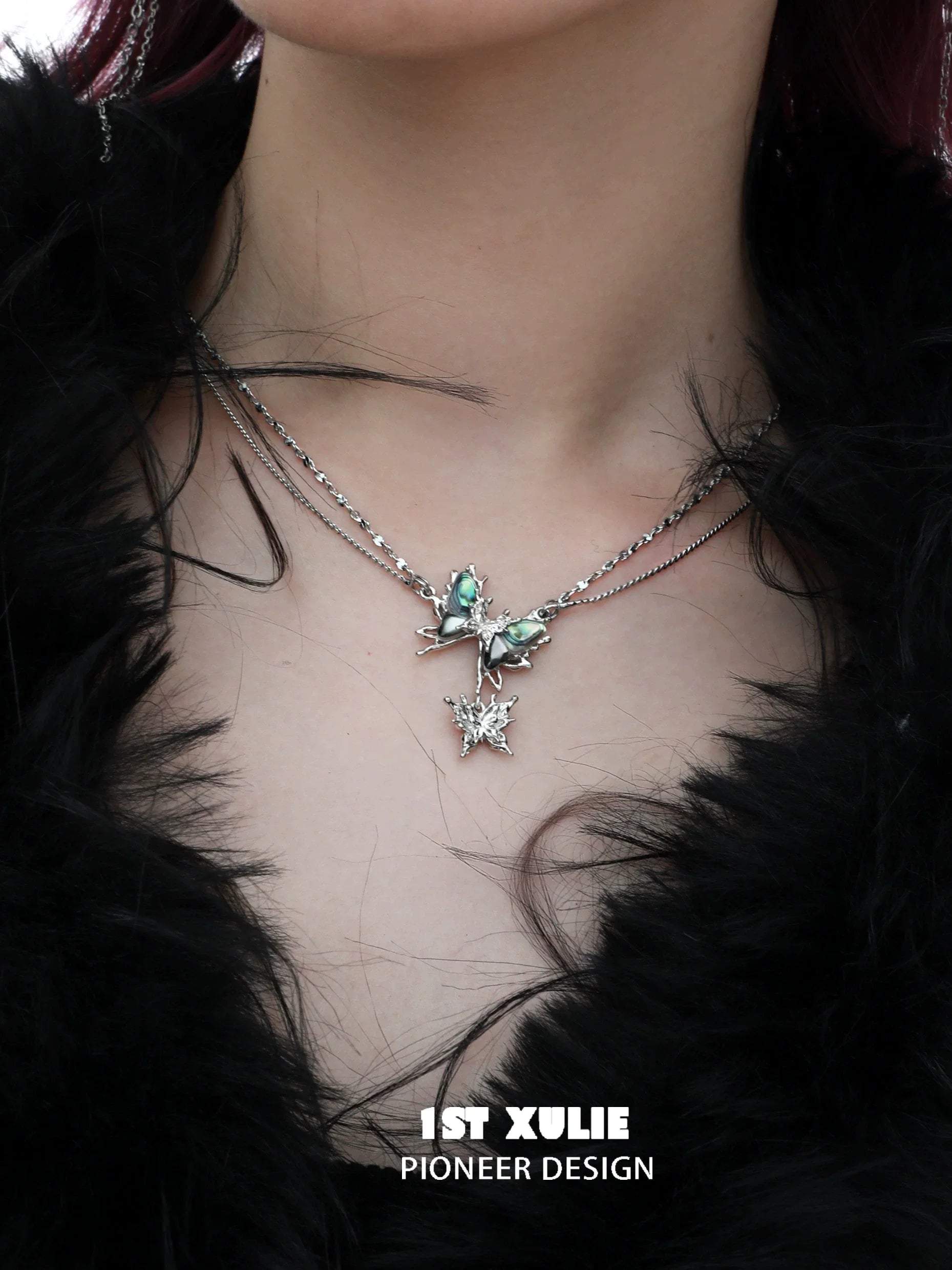Y2K butterfly necklace from 1ST XULIE with layered silver chains and decorative butterfly charm