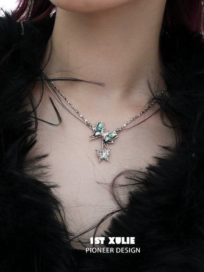 Y2K butterfly necklace from 1ST XULIE with layered silver chains and decorative butterfly charm