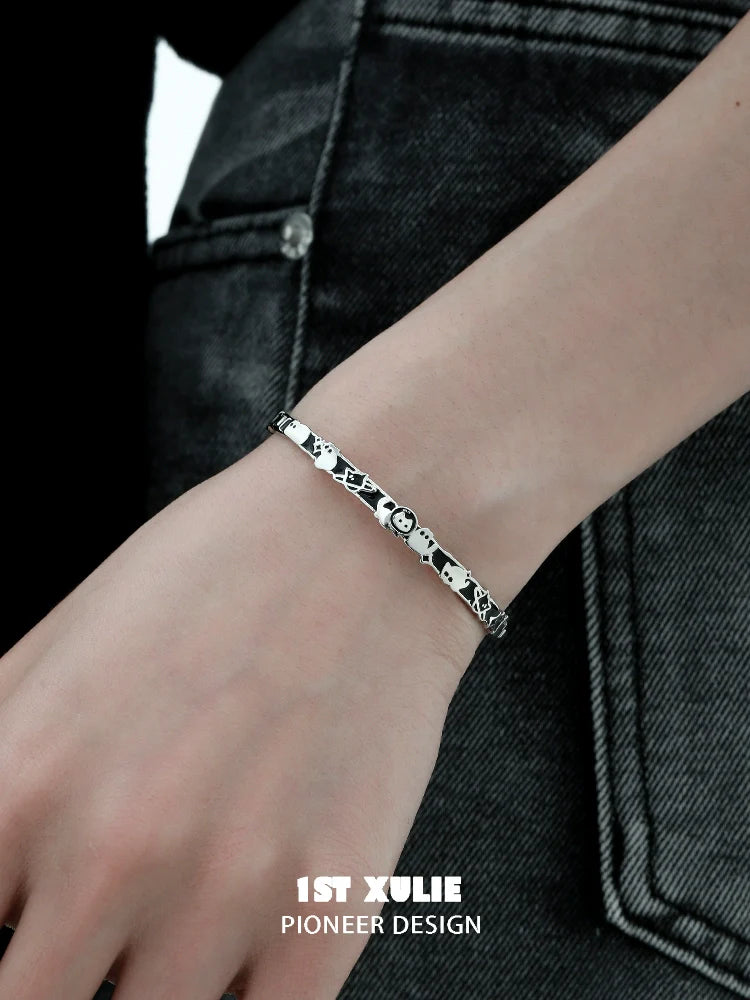 Y2K cat family silver bracelet displayed on a wrist, stylish and trendy for modern fashion lovers
