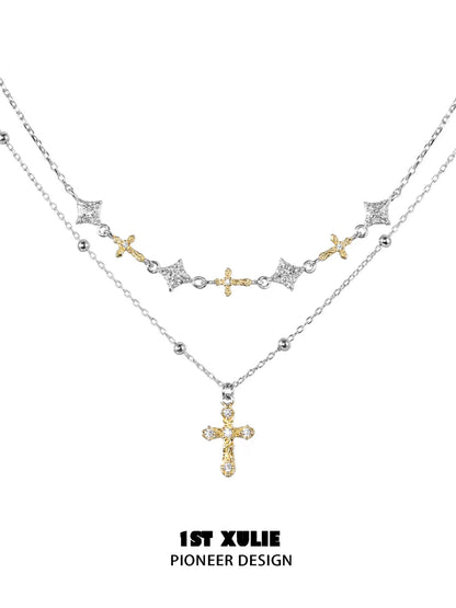 Y2K cross necklace featuring layered silver and gold chains with sparkling cross pendants