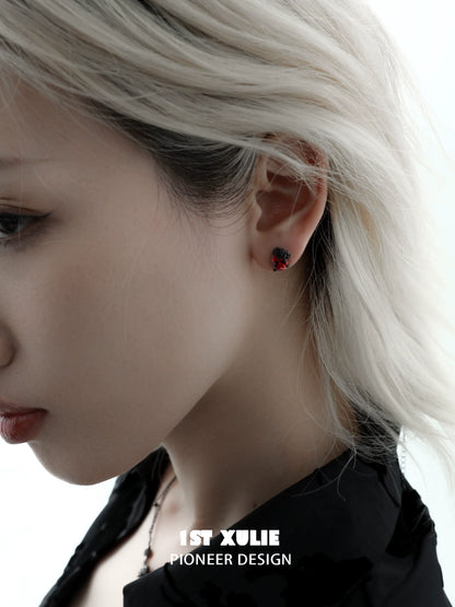 Y2K dark rose earrings worn by a model showcasing unique style and design