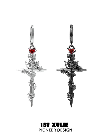 Y2K gothic cross earrings with red rose accents and intricate sword detailing in silver and black finishes