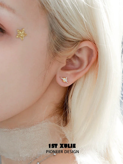 Stylish Y2K lonely dreamer earrings on a model highlighting unique design and contemporary vibe