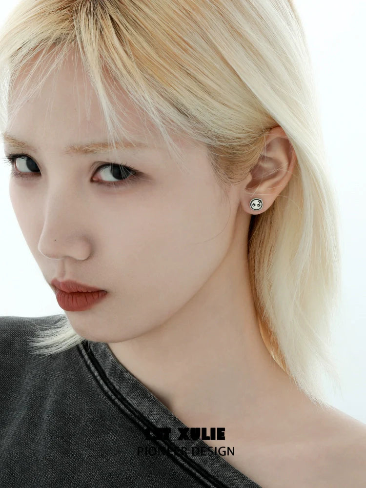 Model wearing Y2K mood diary stud earrings featuring a stylish design for trendy accessories